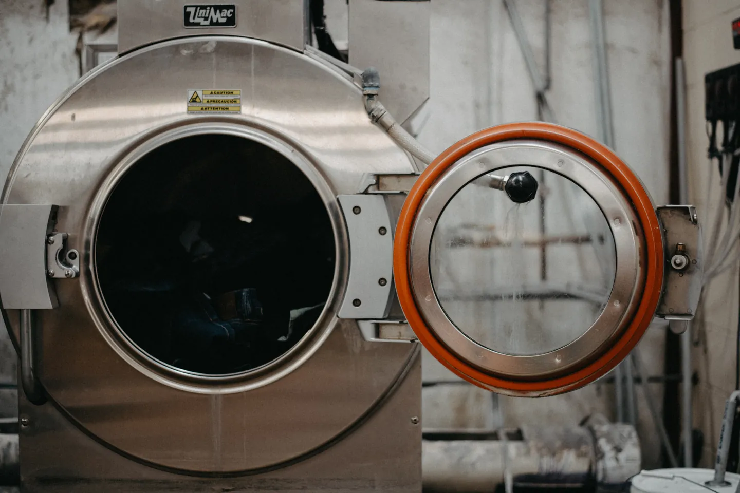 Professional laundry equipment at Tip Top Cleaners